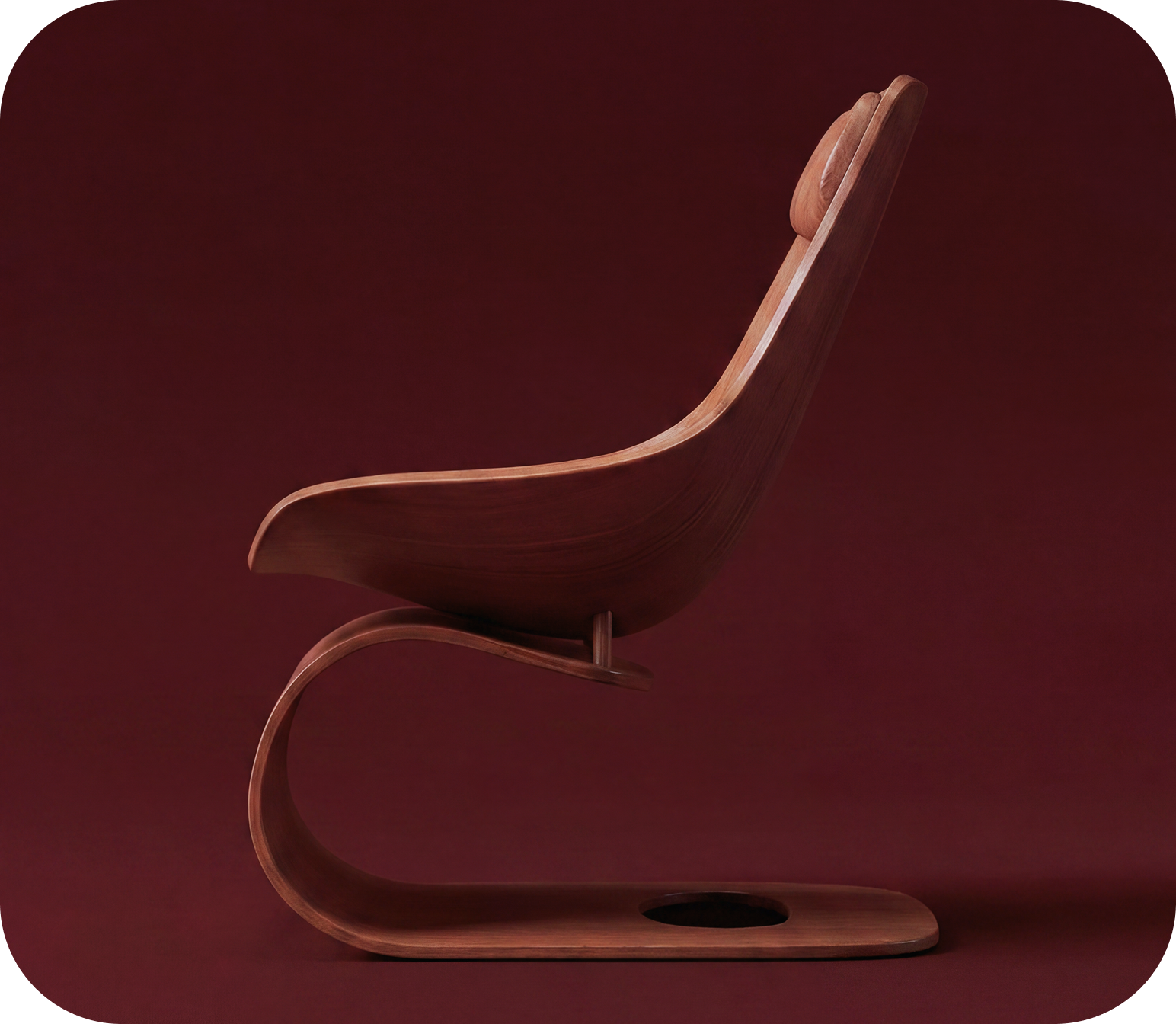 The Loop — a curved bent-wood lounge chair